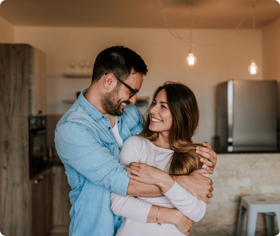 man-woman-hug-living-room