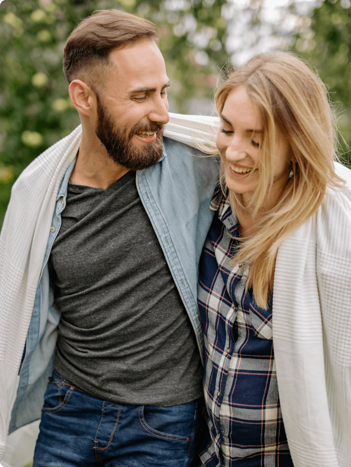 man-woman-walking-shared-blanket