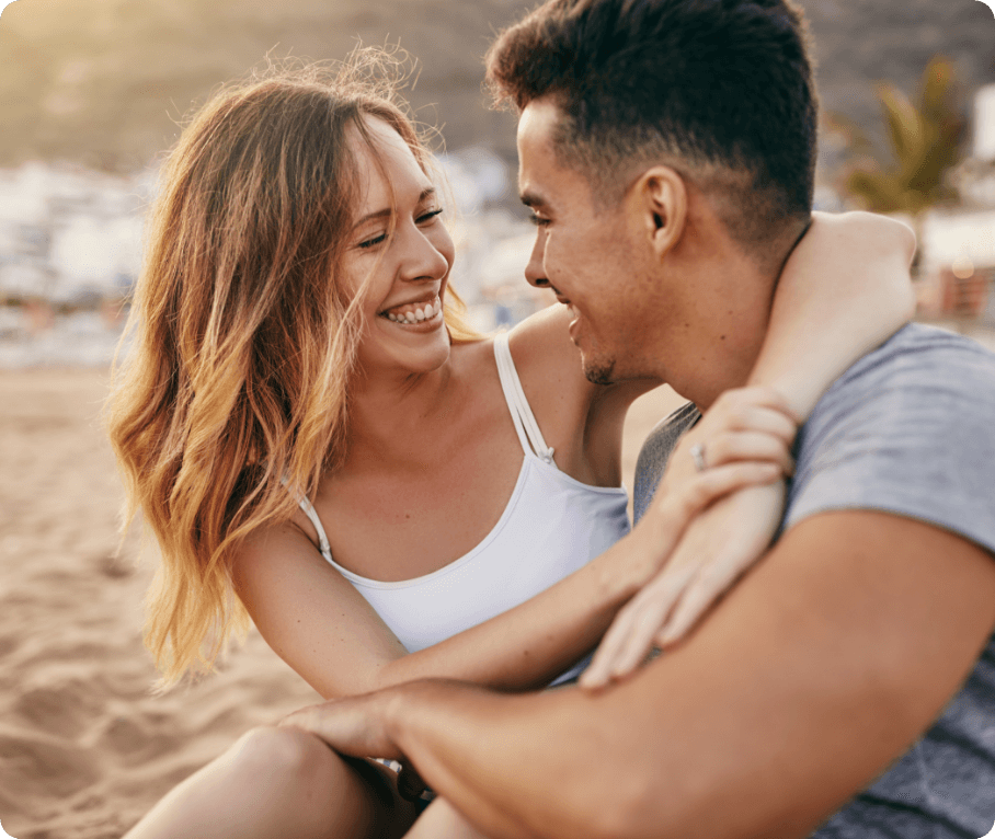 woman-man-looking-at-each-other-beach